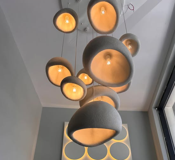Budget hotel furniture in Istanbul with modern bed, side tables, and interior setup.