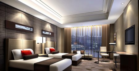 Luxury hotel guest room with bed, furniture, lighting, and amenities featured in a complete hotel equipment list guide.